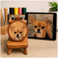 Custom round leather keychain featuring a detailed tan Chihuahua portrait, displayed beside the pet’s reference photo on a tablet.