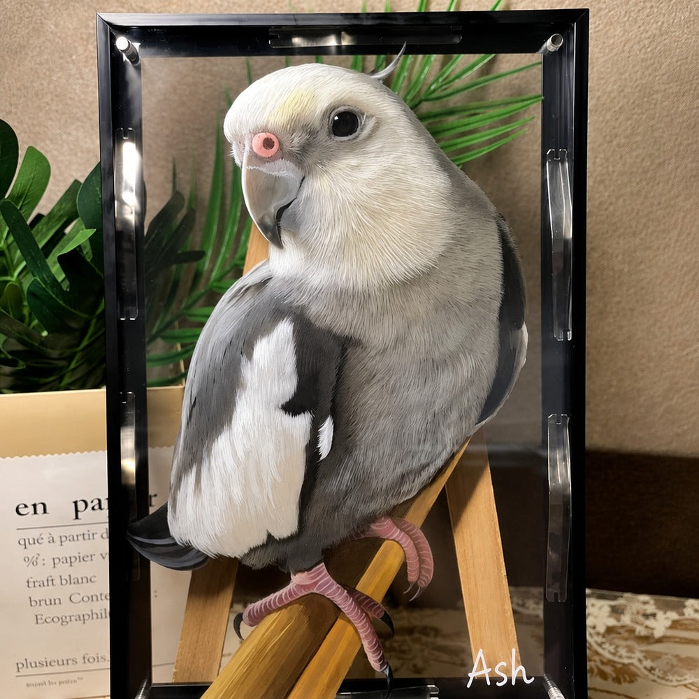 Custom glass pet portrait featuring Ash, a cockatiel perched inside a tall black frame