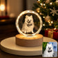 Personalized white dog portrait engraved inside a faceted round crystal night light with a warm wooden LED base.