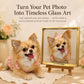 Tan Chihuahua beside a custom glass pet portrait displayed on a wooden easel in a warm floral setting.