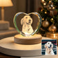 Personalized Golden Retriever portrait engraved inside a heart-shaped crystal night light with a warm wooden LED base, shown beside the original pet photo.