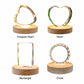 Four crystal night light shape options for personalized pet photo engraving: irregular heart, classic heart, rectangle and circle, each displayed on a warm wooden LED base.