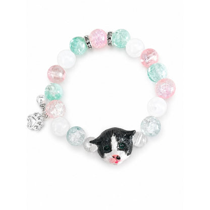 Handmade black-and-white folded-ear cat portrait bracelet with pink, aqua and clear beads on white.