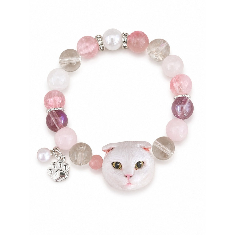 Custom white folded-ear cat portrait bracelet with pink, purple and clear crystal beads on white.