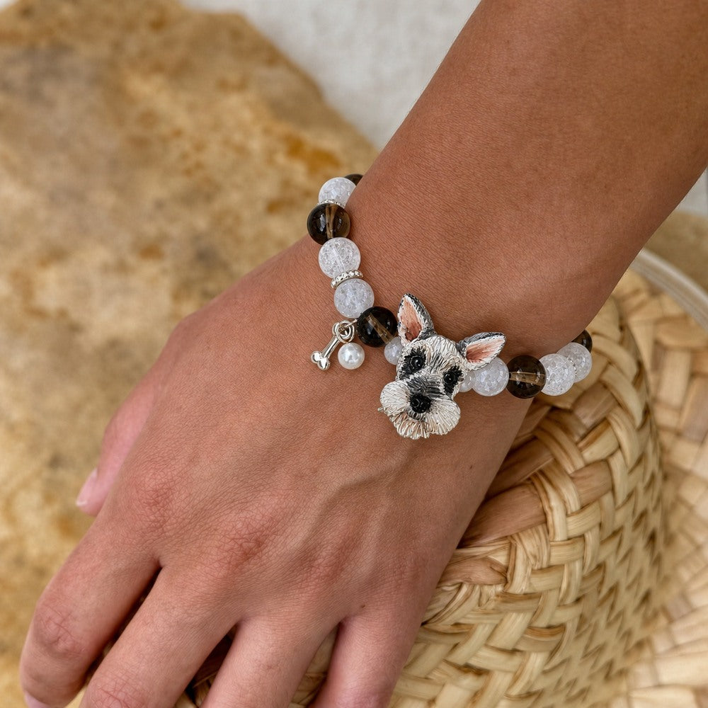 Personalized Schnauzer portrait bracelet worn on the wrist with black, brown and clear crystal beads.