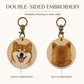 Double-sided custom Shiba Inu embroidered keychain showing the dog’s smiling face on the front and back-of-head portrait on the reverse.