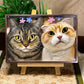 Custom glass pet portrait of a tabby cat and cream-colored cat with floral details, displayed on a wooden easel.
