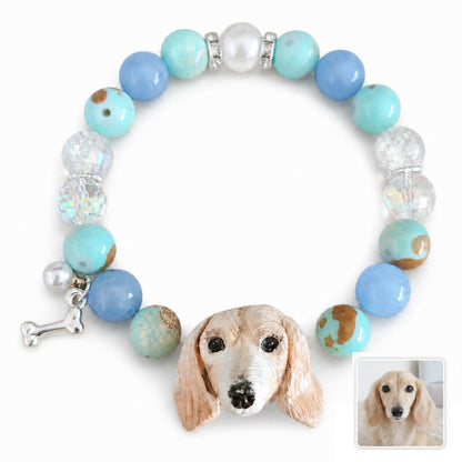 Personalized Dachshund portrait crystal bracelet with a hand-sculpted dog face charm and the original pet photo.