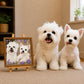 Two small white dogs sitting beside their personalized floral pet portrait displayed on a wooden easel.